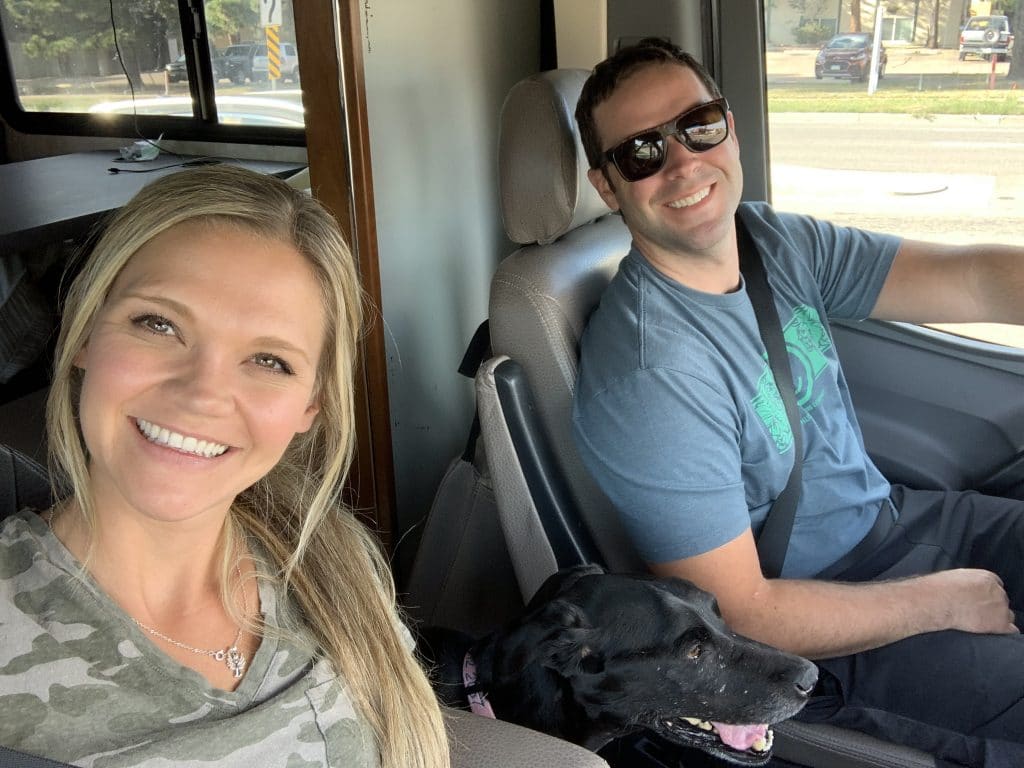 Couple driving in an RV to go meet birth mother on their adoption journey