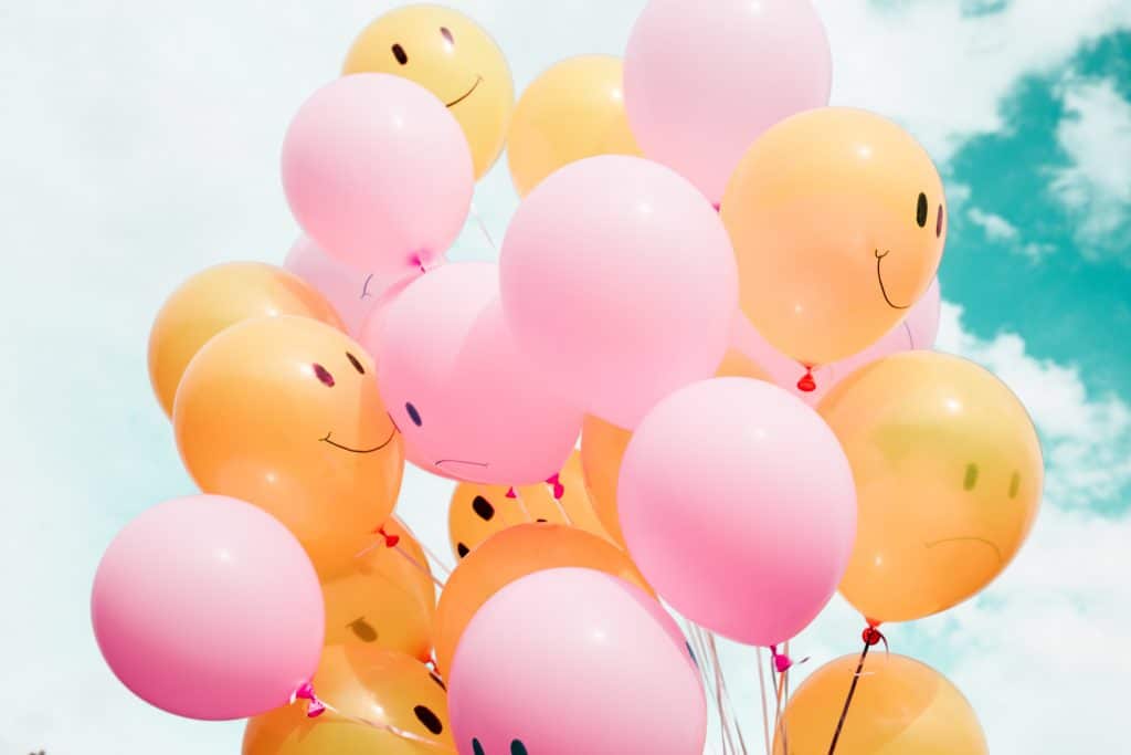 Balloons with smile faces on them